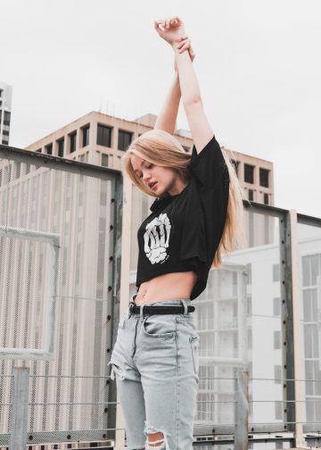 woman stretching her arm upward
